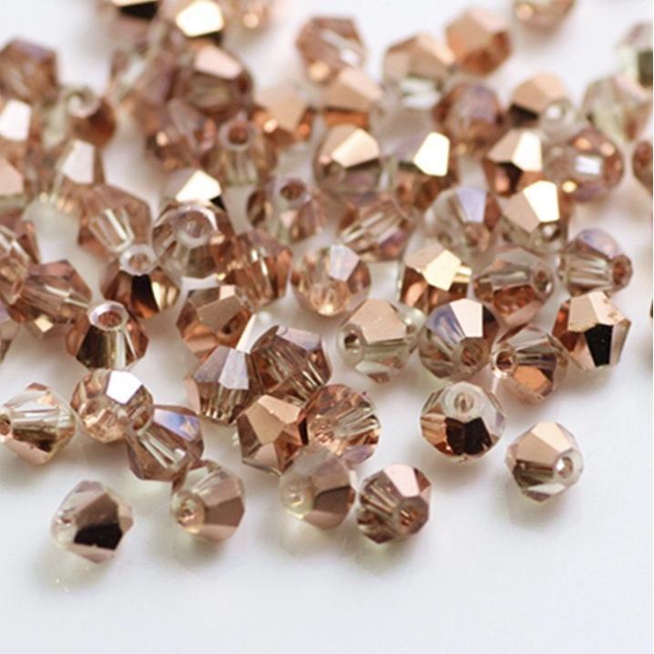 3mm Rose Gold Copper colour, Grade AAA Bicone Beads