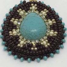 Turquoise Teardrops with champagne/ivory accents. Beadwork